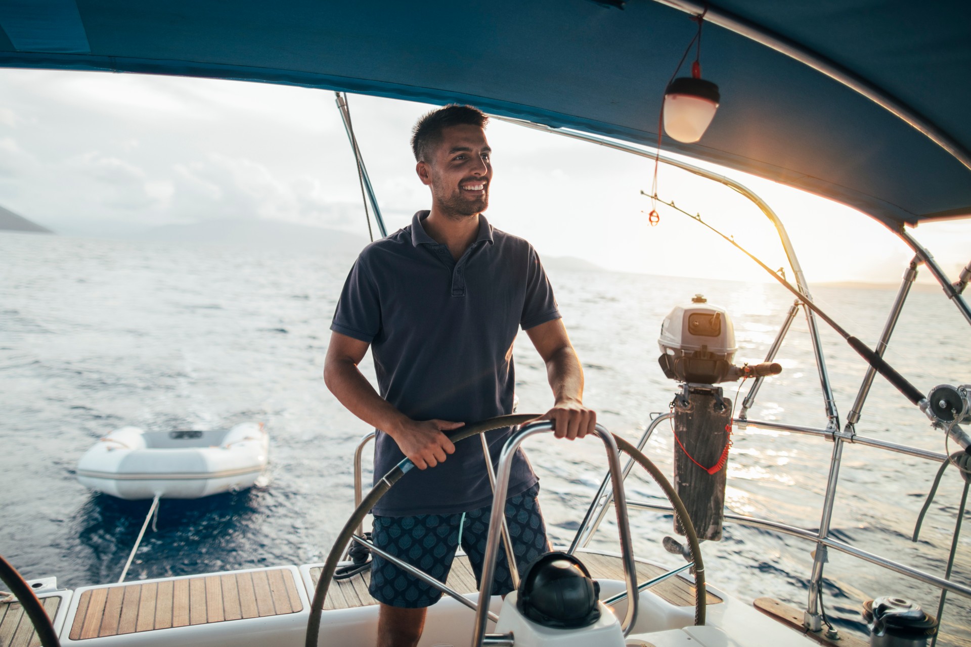 Young man enjoy sailing